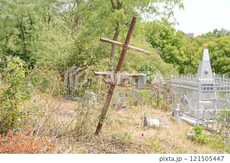 Abandoned graves in a cemetery 121505447
