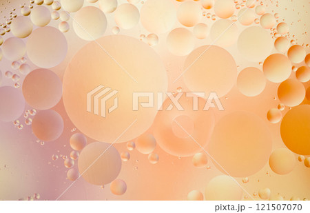 Beige and Orange Abstract Background with Floating Oil Bubbles 121507070