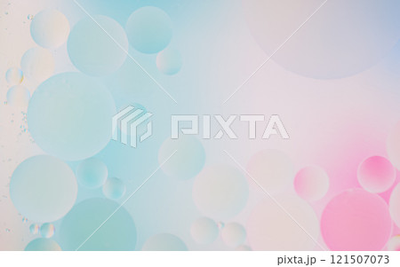 Dreamy abstract background featuring floating pastel bubbles in shades 121507073