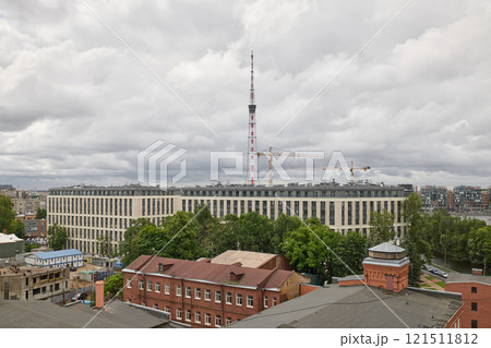 Urban Landscape Featuring Modern Architectural Construction and a Communication Tower 121511812