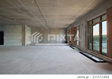 The spacious, modern interior has large windows that enhance the urban experience The spacious, modern interior has large windows that enhance the urban experience 121511868