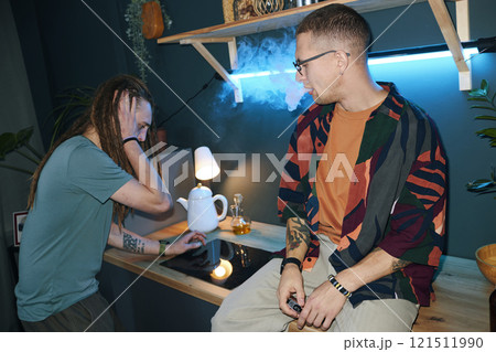 Young People Smoking At Home Party Young People Smoking At Home Party 121511990