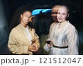 Girls Drinking Wine At Party 121512047