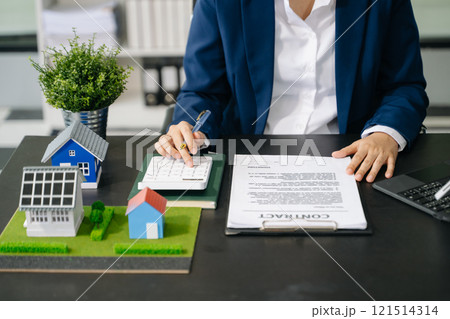 Considering buying a home, investing in real estate. Broker signs a sales agreement. agent, lease agreement, successful 121514314