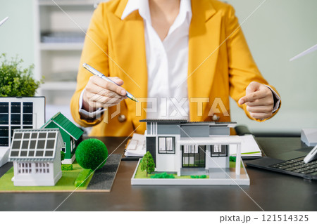 Signing a contract. Client and broker agent, lease agreement, successful deal and  Young business sitting at the desk 121514325
