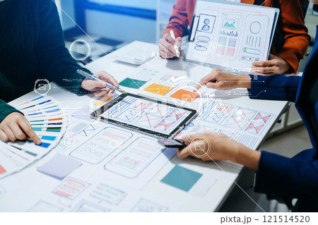 UX developer and ui designer brainstorming about mobile app interface wireframe design with customer breif UX developer and ui designer brainstorming about mobile app interface wireframe design with customer breif 121514520