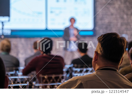 Audience attentively watching business presentation in conference Audience attentively watching business presentation in conference 121514547