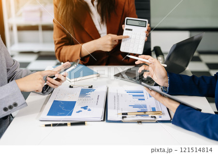 Business people and lawyers discussing contract papers sitting at the table. Concepts of law, advice, legal services. Business people and lawyers discussing contract papers sitting at the table. Concepts of law, advice, legal services. 121514814