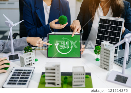 Business team people planning hand using laptop for working technology and business Net zero and carbon neutral concept.NET ZERO icons and symbols save the eco world 121514876