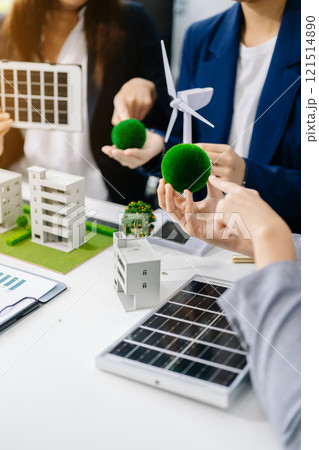 business team people planning and discussing on recycle reduce reuse policy symbol in office meeting room. Green business company and Solar Energy 121514890