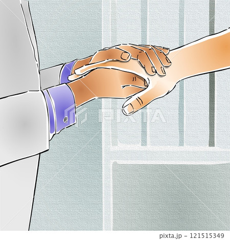 Two hands are clasped together in a comforting gesture, one wearing a white sleeve and the other bare.  121515349