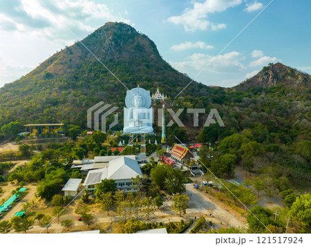 Aerial of white big Buddha front of the big mountain Aerial of white big Buddha front of the big mountain 121517924