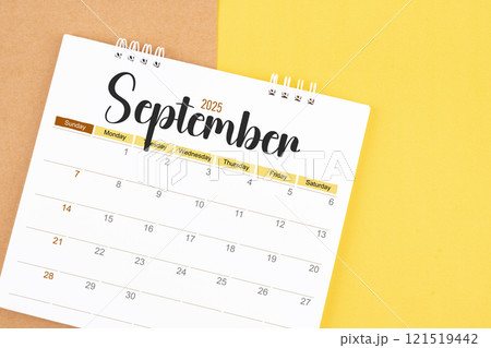September 2025 desk calendar on brown and yellow, Planning for business. September 2025 desk calendar on brown and yellow, Planning for business. 121519442