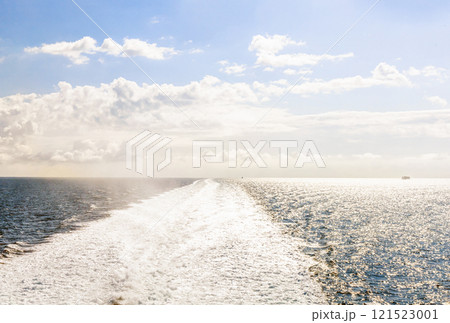 Water trail behind cruise ship. 121523001