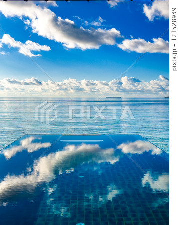 Sunset views from overwater pool villa in Maldives Sunset views from overwater pool villa in Maldives 121528939