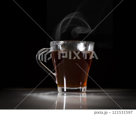 A glass with tea A glass with tea 121531597