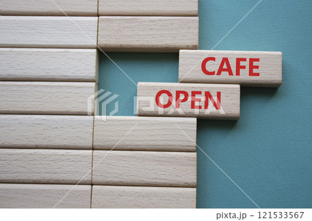 Cafe Open symbol. Concept word Cafe Open on wooden blocks. Beautiful grey green background. Business and Cafe Open concept. Copy space Cafe Open symbol. Concept word Cafe Open on wooden blocks. Beautiful grey green background. Business and Cafe Open concept. Copy space 121533567