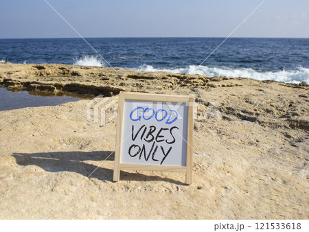 Good Vibes only symbol. White Blackboard with Concept words Good Vibes only. Beautiful sea background. Business and Good Vibes only concept. Copy space. Good Vibes only symbol. White Blackboard with Concept words Good Vibes only. Beautiful sea background. Business and Good Vibes only concept. Copy space. 121533618