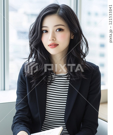 Young Woman in Business Attire with Natural Makeup 121533841
