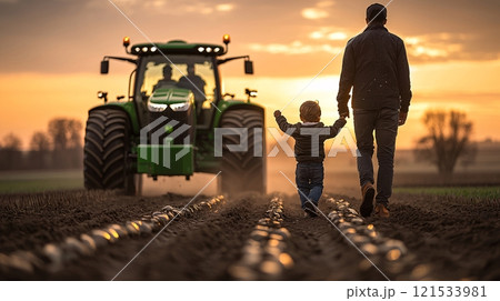 Father and Child Walking in Farm at Sunset Father and Child Walking in Farm at Sunset 121533981