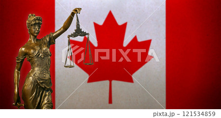 Lady Justice before a flag of Canada 121534859