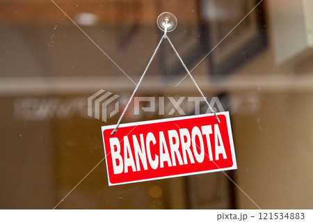 Bankruptcy sign written in Spanish 121534883