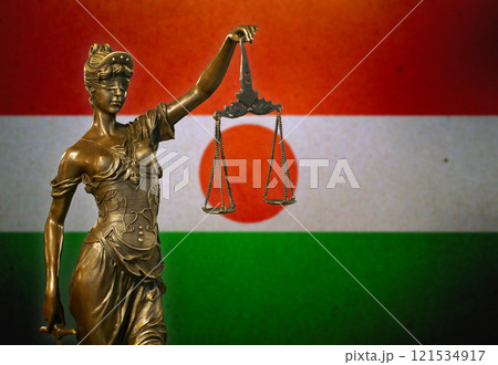 Lady Justice before a flag of Niger Lady Justice before a flag of Niger 121534917