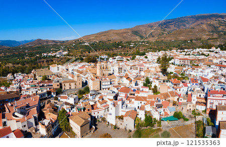 Orgiva town aerial panoramic view in Alpujarras, Spain 121535363