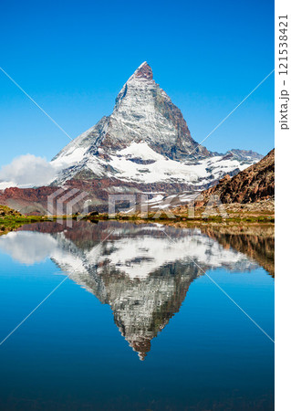 Riffelsee lake and Matterhorn, Switzerland 121538421