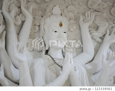 Marble sculpture symbolizing Buddhism in Asia inside a temple in Thailand. 121539561
