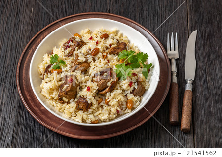 beef and rice in white bowl, top view beef and rice in white bowl, top view 121541562