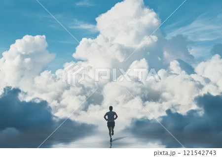 A man is running through a field of clouds, . The scene is peaceful 121542743