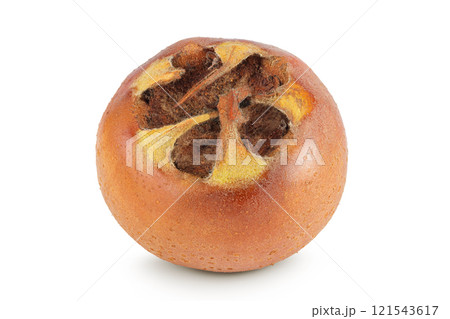 Brown fresh medlar isolated on white background. Mespilus germanica close-up Brown fresh medlar isolated on white background. Mespilus germanica close-up 121543617