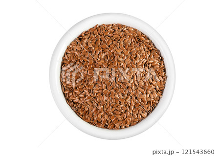 flaxseed in ceramic bowl isolated on white background. Top view. Flat lay 121543660