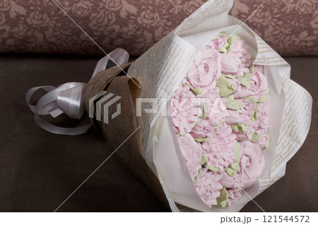 A bouquet of marshmallows. Zephyr flowers. Packed in craft paper. A bouquet of marshmallows. Zephyr flowers. Packed in craft paper. 121544572