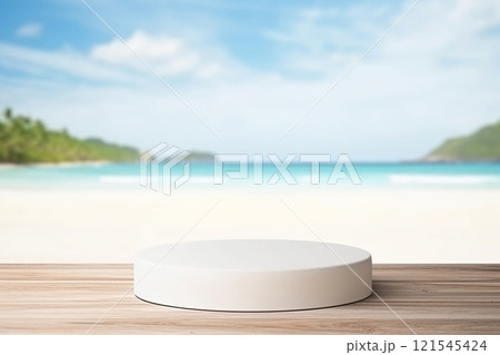A white circular pedestal is placed on a weathered wooden table, framed by the tranquil vista of a sandy beach, a blue ocean, and a light blue sky. Created with generative AI tools A white circular pedestal is placed on a weathered wooden table, framed by the tranquil vista of a sandy beach, a blue ocean, and a light blue sky. Created with generative AI tools 121545424
