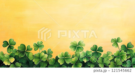 Lush green clovers against a vibrant yellow background. 121545662