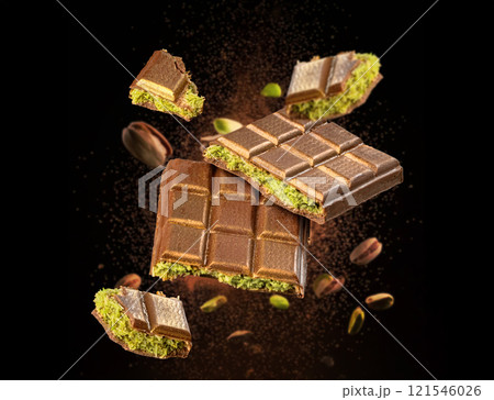 Tasty pistachio chocolate bars 121546026