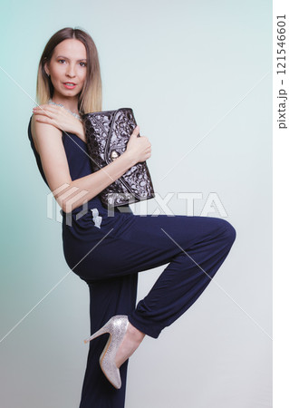 Elegant fashion woman with leather handbag Elegant fashion woman with leather handbag 121546601