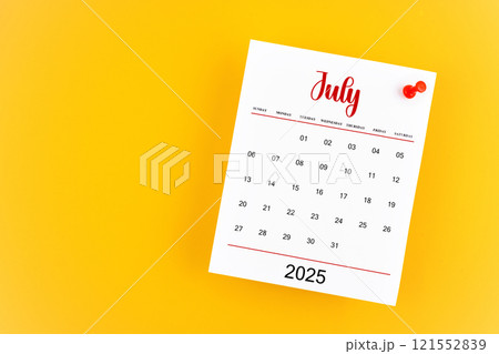 July 2025 calendar page with red push pin on yellow background. 121552839