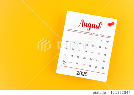 August 2025 calendar page with red push pin on yellow background. 121552844