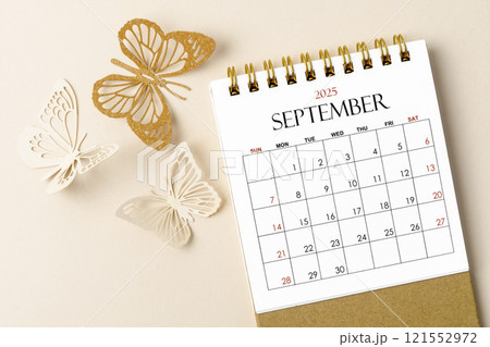 September 2025 desk calendar for the organizer to plan and reminder and butterfly paper on yellow. 121552972