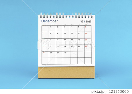 December 2025, Monthly desk calendar for 2025 year on Blue background. December 2025, Monthly desk calendar for 2025 year on Blue background. 121553060