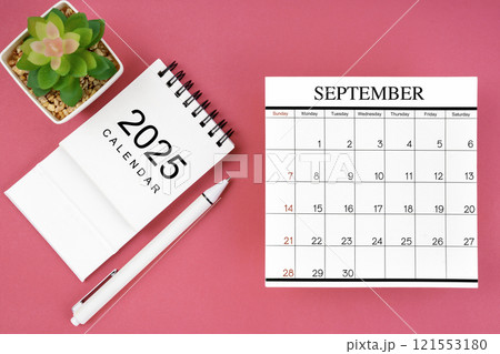 White calendar for September 2025 and pen on pink background, planning concept. White calendar for September 2025 and pen on pink background, planning concept. 121553180