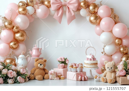 A pink and white party with balloons, teddy bears, and a tea set 121555707