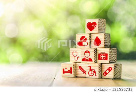 Lay out wooden blocks with icons of medical health. health insurance for your health concept. Healthcare medical business, medical technology equipment icon. 121556732