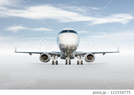 Front view of white passenger airplane isolated on bright background with sky 121558775