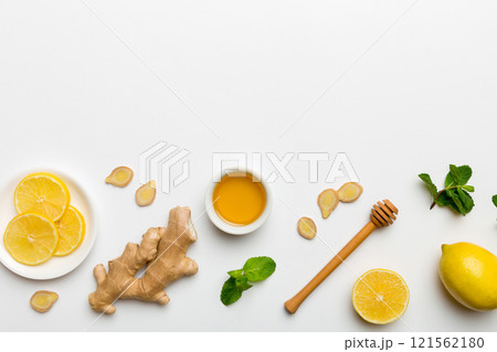 Natural cold and flu home remedies. Natural ingredients for immunity stimulation and viruses protection. top view flat lay Natural cold and flu home remedies. Natural ingredients for immunity stimulation and viruses protection. top view flat lay 121562180