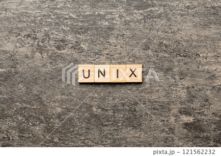 Unix word written on wood block. Unix text on table, concept 121562232