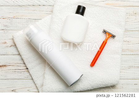 shaving man set. shaving machine, towel, lotion and shaving foam on colored background. Men bath Accessories top view shaving man set. shaving machine, towel, lotion and shaving foam on colored background. Men bath Accessories top view 121562281